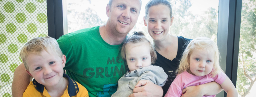 A carer for a special needs child: a family portrait